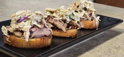 Pulled Pork Crostini with Spicy Mustard Slaw