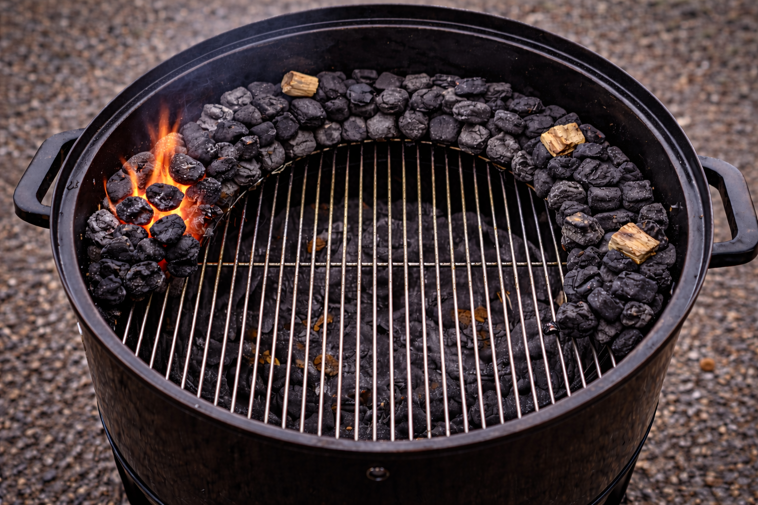 Snake method charcoal layout inside a kettle grill