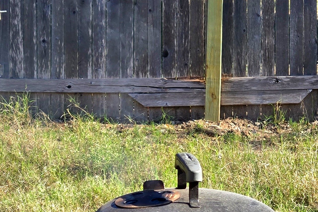 Very faint smoke coming off a smoker.